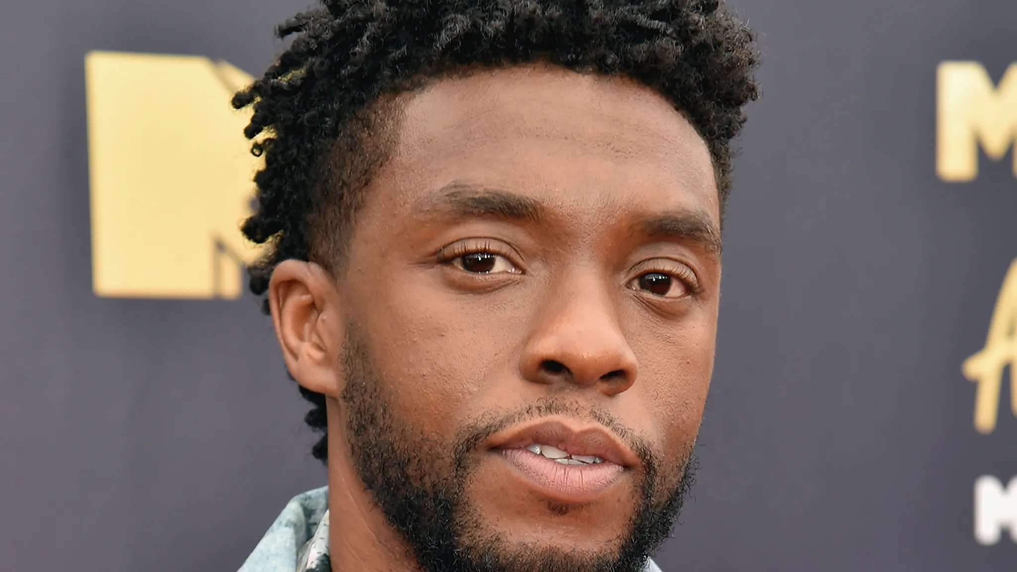 Chadwick Boseman’s Widow Says She Paid Parents Over $1M Despite Brothers’ Claims