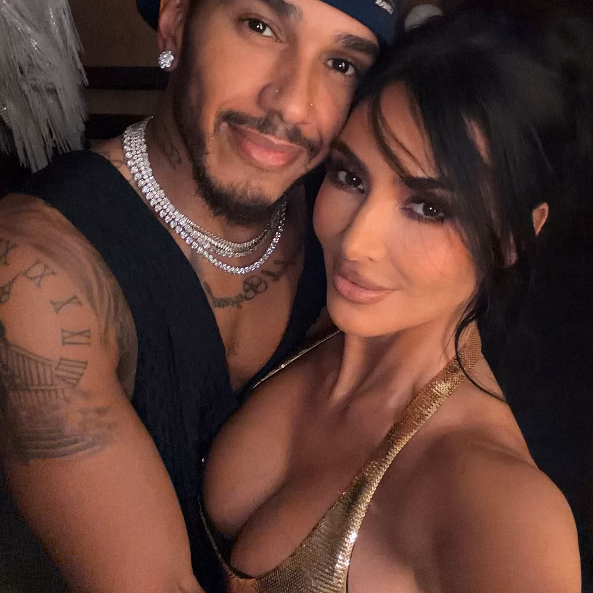 Kim Kardashian and Lewis Hamilton Share Steamy Kiss in Romantic Paris Photo