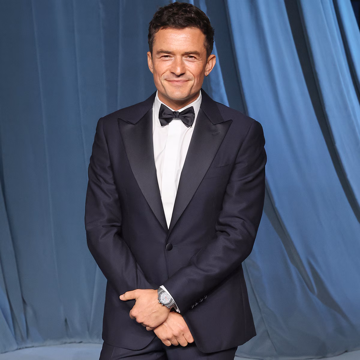 Orlando Bloom Shows Off Rock-Solid Abs on Family Getaway